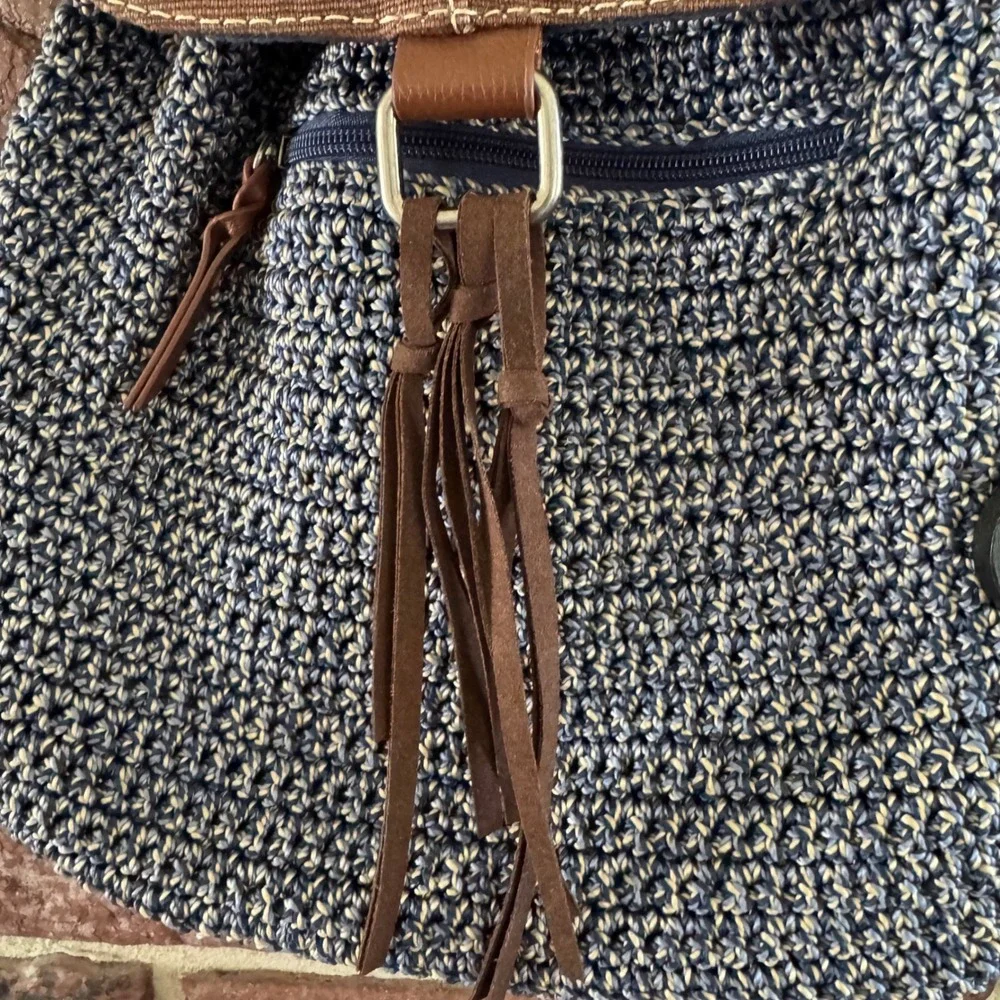 The Sak Brown & Navy Woven Backpack with Tassel Fringe and Embroidered Strap